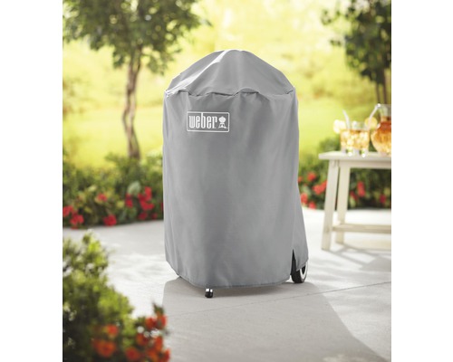 Weber Logo auf einer grauen Grill Abdeckhaube