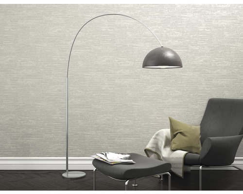 Leseecke mit Bogenlampe, Sessel und Fußhocker