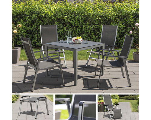 Gartensitzgruppe mit Tisch und vier Stühlen auf einer Terrasse