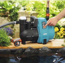 Gartenpumpe zur Wasserförderung mit Schlauchanschluss und Bedienknopf