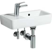 Waschbecken mit Armatur und Siphon