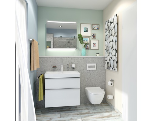 Helles Badezimmer mit Waschbeckenunterschrank, Spiegelschrank, Toilette und Heizkörper