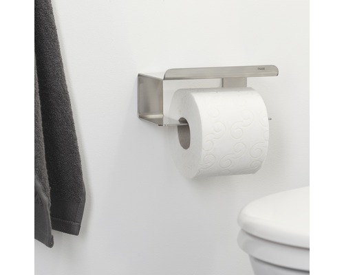 Toilettenpapierhalter aus Edelstahl mit Papierrolle und Tiger Logo.