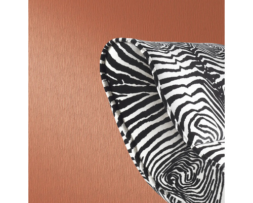 Detailaufnahme eines Sessels mit Zebra Musterbezug