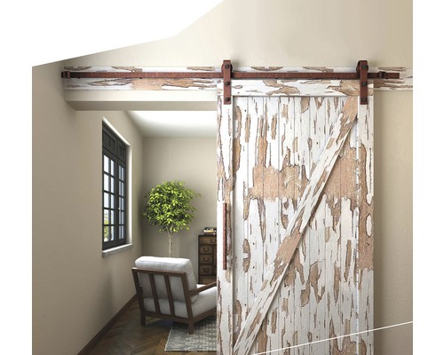 Innenraum mit Schiebetür im Scheunenstil und Sitzbereich