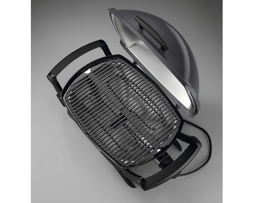 Elektrischer Grill mit offenem Deckel und Grillrost.