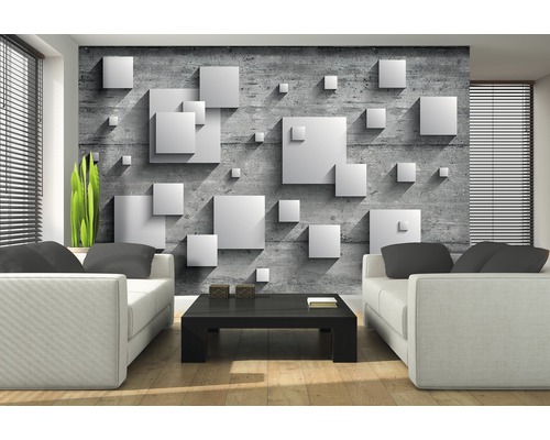 Wohnzimmer mit grauer Betonoptik-Tapete und weißen 3D-Quadraten