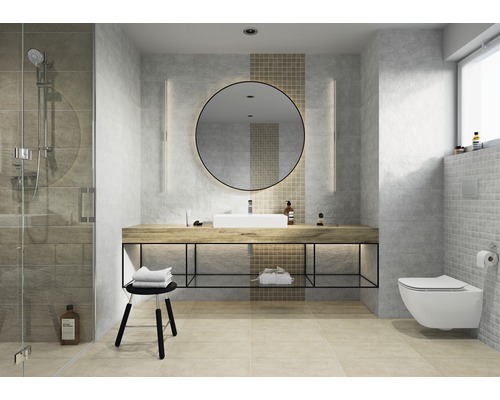 Modernes Badezimmer mit Dusche, Waschtisch mit rundem Spiegel und Wandtoilette