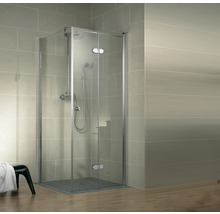 Eckdusche mit Drehtür und Duscharmatur im Badezimmer.