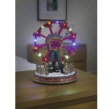 Beleuchtetes, bewegliches Riesenrad als Weihnachtsdekoration mit Figuren.