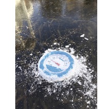 Thermometer auf einer Eisfläche