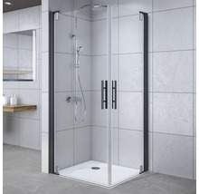 Eckdusche mit Duschwanne und schwarzem Rahmen im Badezimmer.
