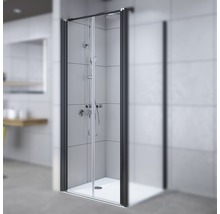 Duschkabine mit schwarzem Rahmen in einem Badezimmer
