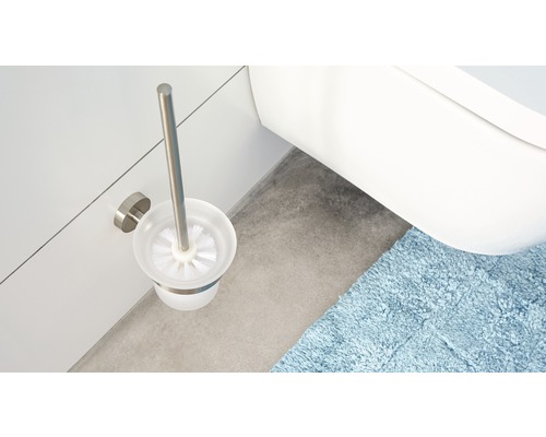 Toilettenbürste mit Behälter an der Wand montiert