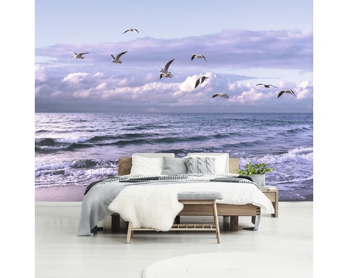 Schlafzimmer mit Fototapete mit Strandmotiv und Möwen