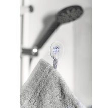 Handtuch an einem Saugnapfhalter in einer Dusche
