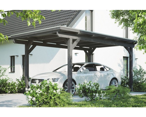 Einzelcarport Konsta Aluminium-Dachplatten inkl. H-Anker 304x500 cm schiefergrau Holzcarport mit Auto auf gepflastertem Untergrund vor einem Haus