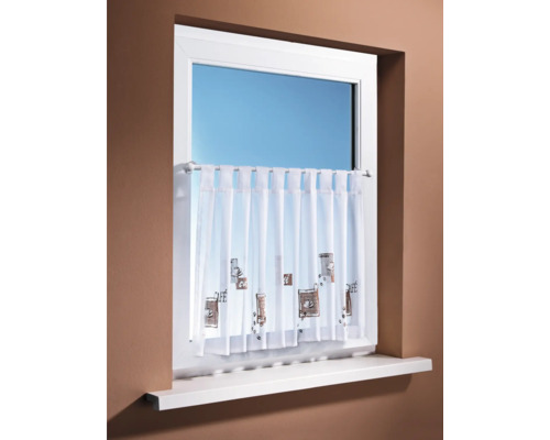 Fenster mit Bistrogardine mit Café-Motiv