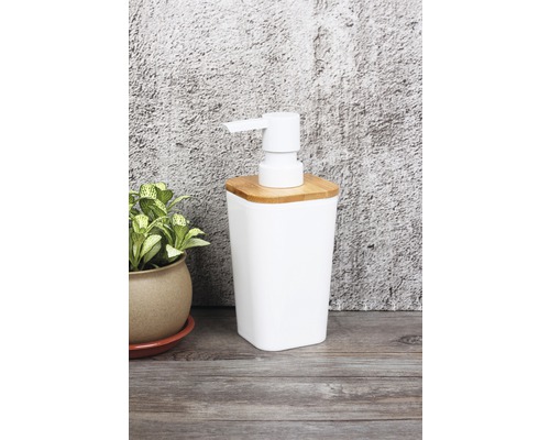 Weißer Seifenspender mit Bambusdeckel