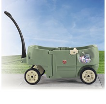 Grüner Kinder Bollerwagen mit Griff und Rädern.