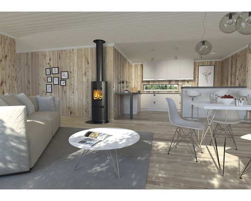 Wohnzimmer mit Kaminofen, Sofa, Couchtisch und Essbereich in hellem, freundlichem Design
