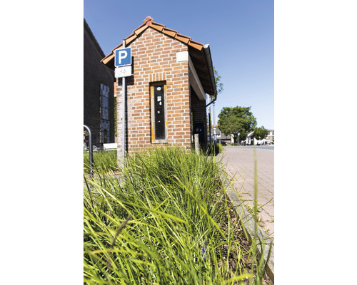 Fahrradparkplatz mit Unterstand aus Ziegelsteinen