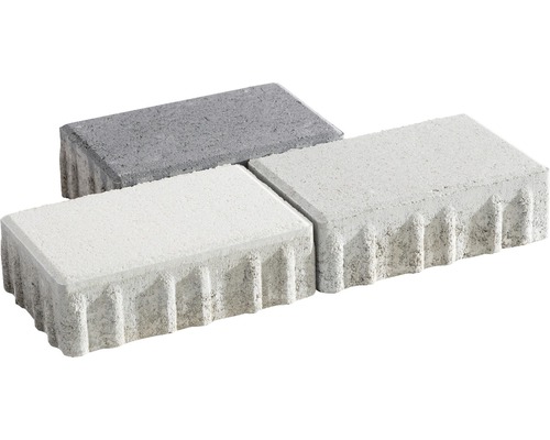 Drei Pflastersteine aus Beton
