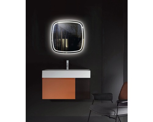 Badezimmer mit Waschtisch, Waschbecken, Armatur und beleuchtetem Spiegel