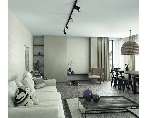 Wohnzimmer mit Sofa, Esstisch und Beleuchtungssystem