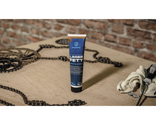 Bike Broz Lagerfett für Fahrräder auf einer Werkbank mit Werkzeug