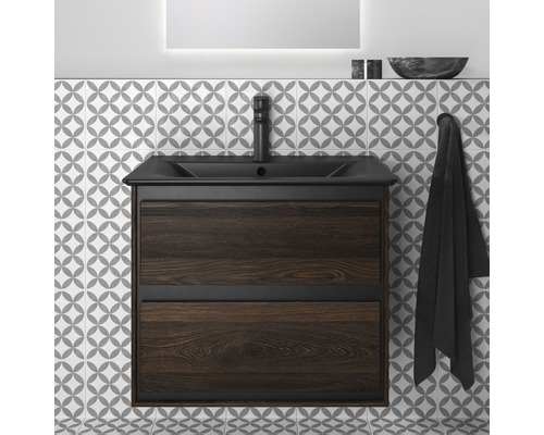 Waschtischunterschrank mit zwei Schubladen und Armatur vor gemusterter Wand