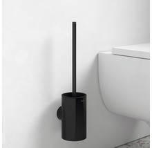 Wandmontierte WC-Bürste aus Kunststoff neben Toilette