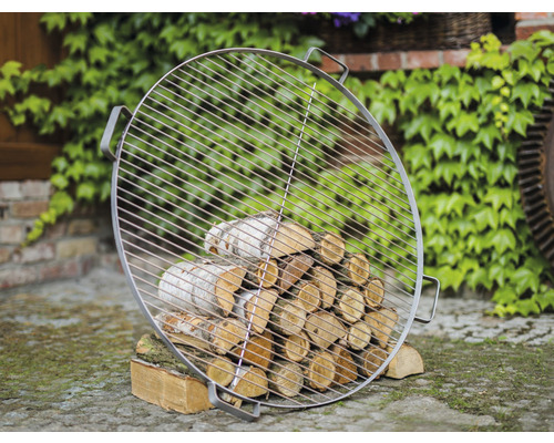 Runder Grillrost mit Holzscheiten