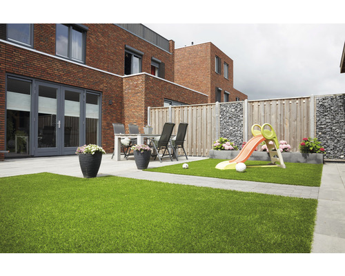 Garten mit Kunstrasen, Spielplatz und Sitzbereich