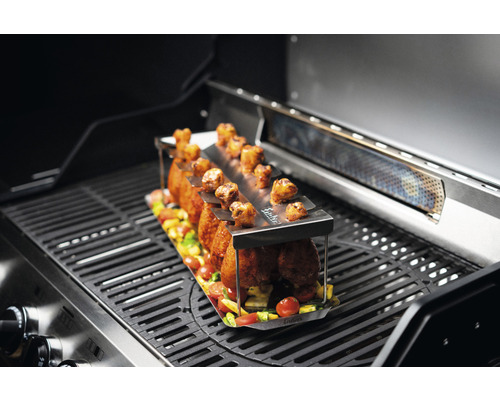 Gefüllter Hähnchenkeulenhalter auf einem Grill