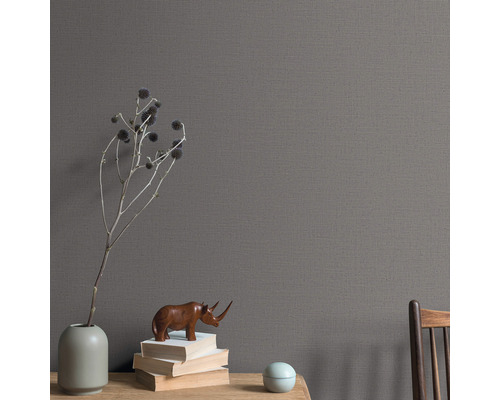 Nahaufnahme einer grauen Textiltapete mit Dekoration