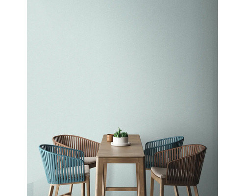 Esstischgruppe mit Holztisch und vier Stühlen im Essbereich