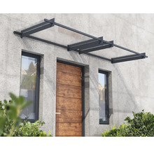 Haustürvordach aus Glas und Metall an einer Hausfassade