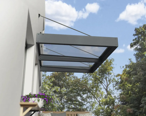 Vordach aus Aluminium und Glas am Haus