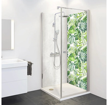 Eckdusche mit Duscharmatur und Pflanzenmuster in Badezimmerumgebung