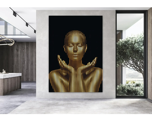 Dekoratives Wandbild mit abstraktem goldenem Frauenmotiv in einem modernen Raum