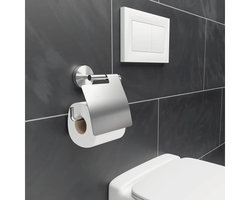Toilettenpapierhalter aus Metall mit Toilettenspülung an der Wand