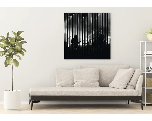 Dekoratives Bild mit Musikband-Motiv über einer Couch