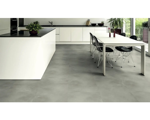 Helle Küche mit Kücheninsel, Esstisch und Bodenfliesen in Betonoptik