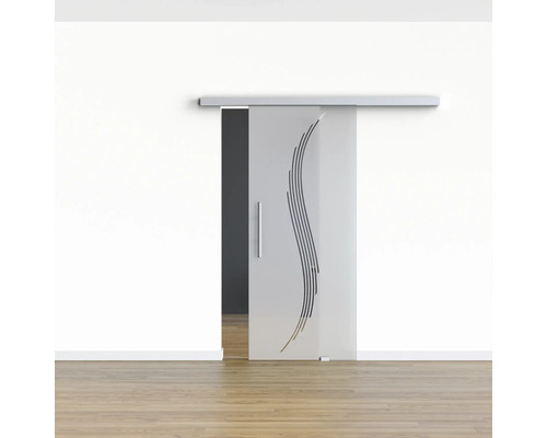 Glasschiebetür mit Wellenmuster vor einer Wand