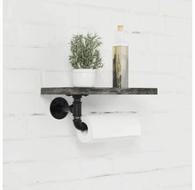 Regal mit Toilettenpapierhalter im Badezimmer mit Pflanze und Dekoration