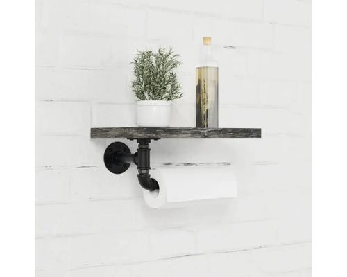 Regal mit Toilettenpapierhalter im Badezimmer mit Pflanze und Dekoration