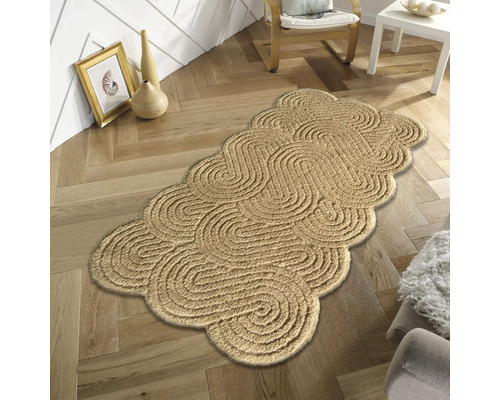 Dekorativer Teppich mit gewundenem Design auf Holzboden