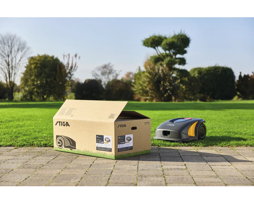 Stiga Mähroboter in Verpackung und Stiga Logo