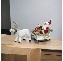 Weihnachtliche Dekoration: Weihnachtsmann im Schlitten mit Rentier